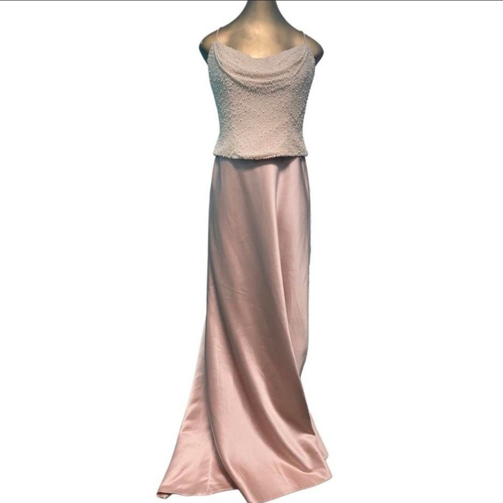 Blush pink formal gown with a beaded cowl neck bust.